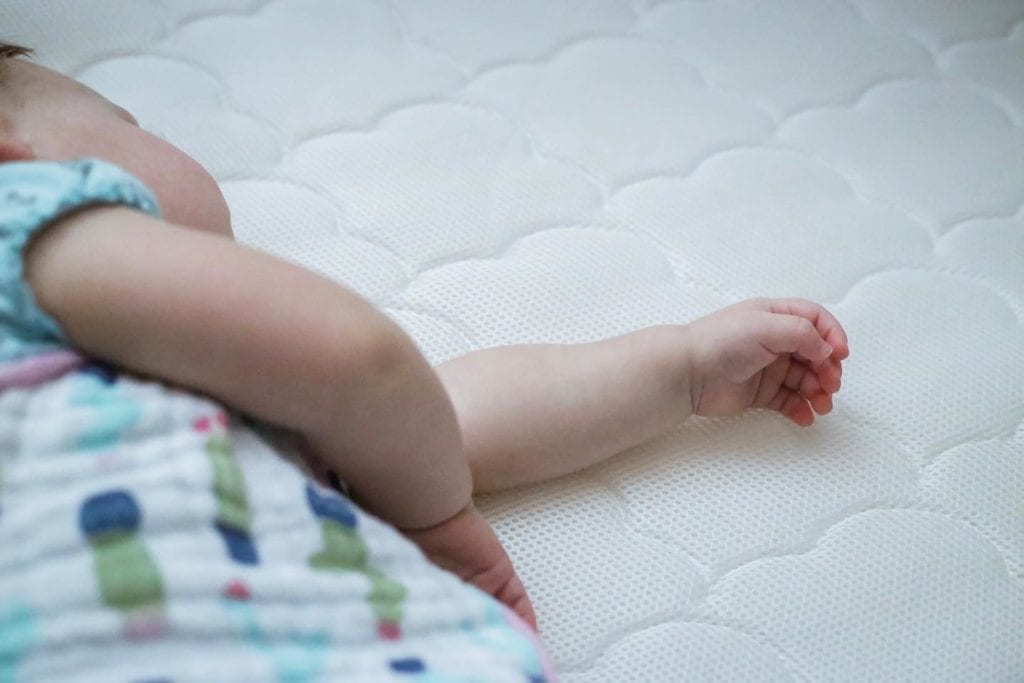 baby sleeping on crib mattress favorite things link