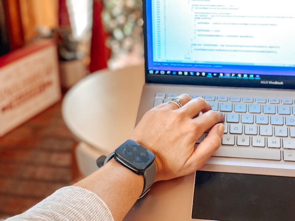 wearing shungite bracelet while working at laptop